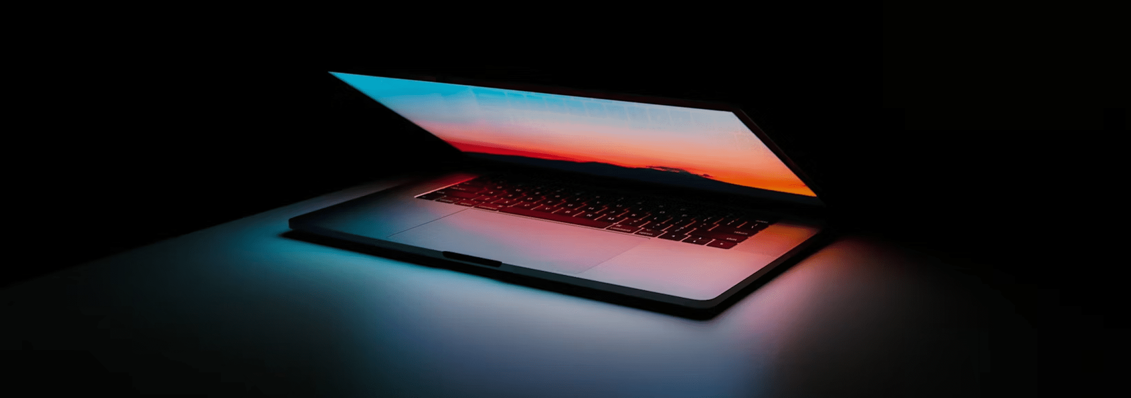 Ordinateur portable avec coucher de soleil